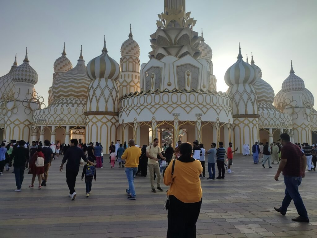 a large group of people walking around a building